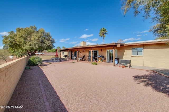 back of house featuring a patio area