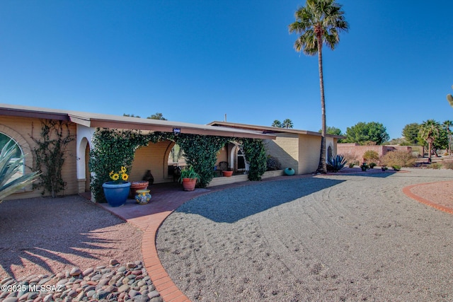 rear view of property with a patio area