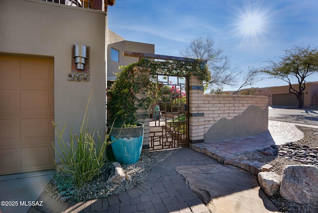 view of patio / terrace featuring a garage