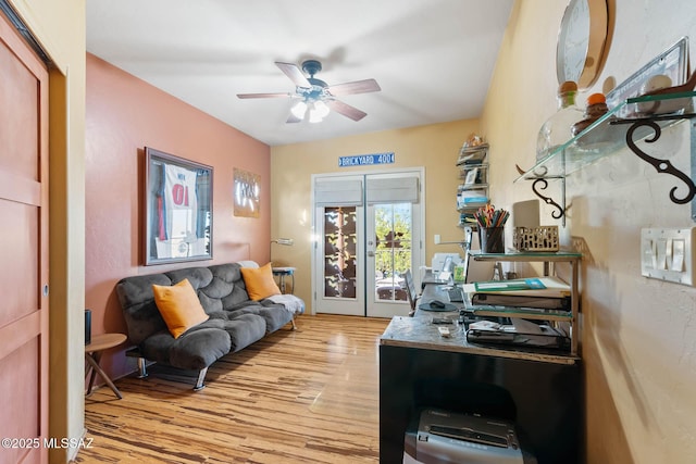 office area featuring light hardwood / wood-style flooring and ceiling fan