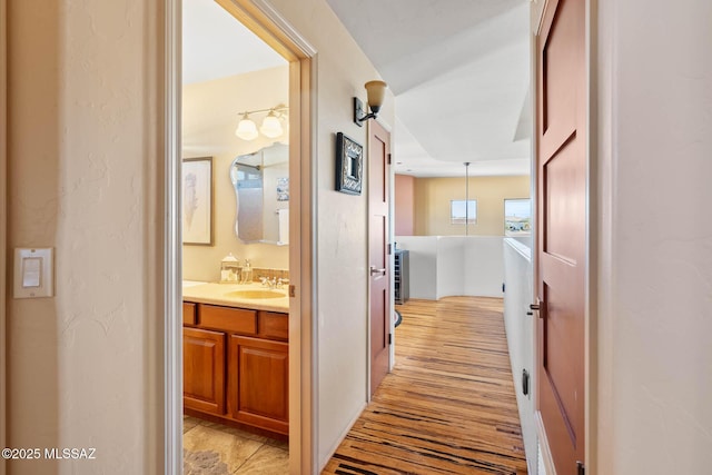 hallway featuring sink