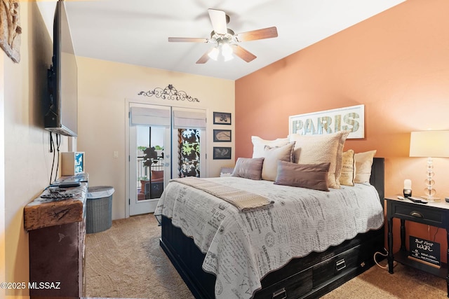 bedroom with ceiling fan, light carpet, and access to outside