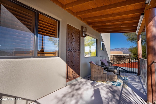 balcony featuring a mountain view