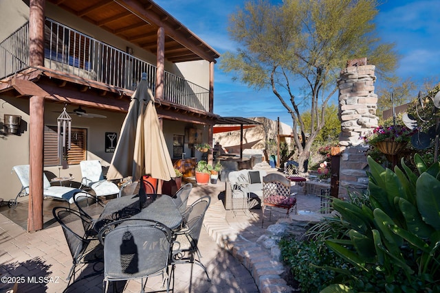 view of patio / terrace with a balcony