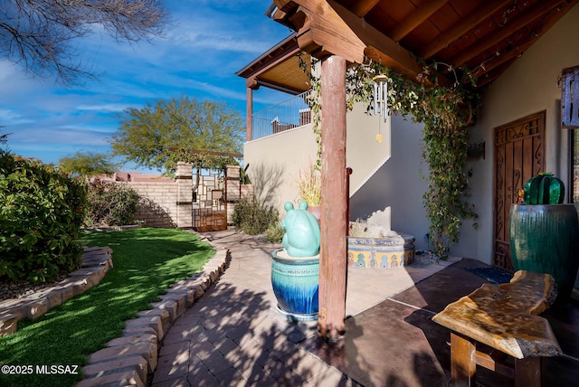 view of patio / terrace with a balcony