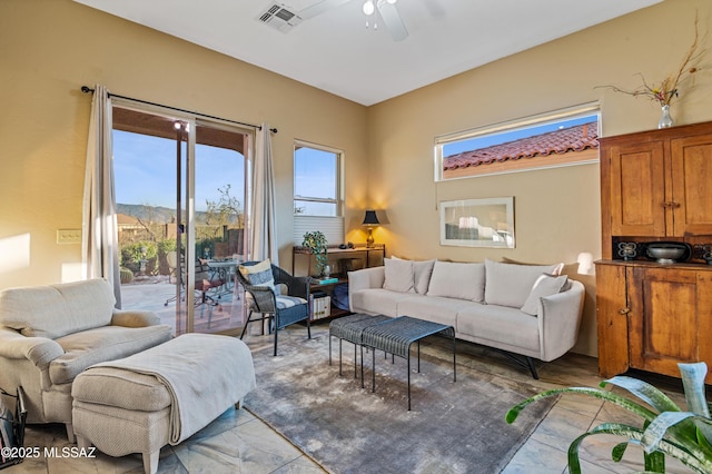 living room featuring ceiling fan