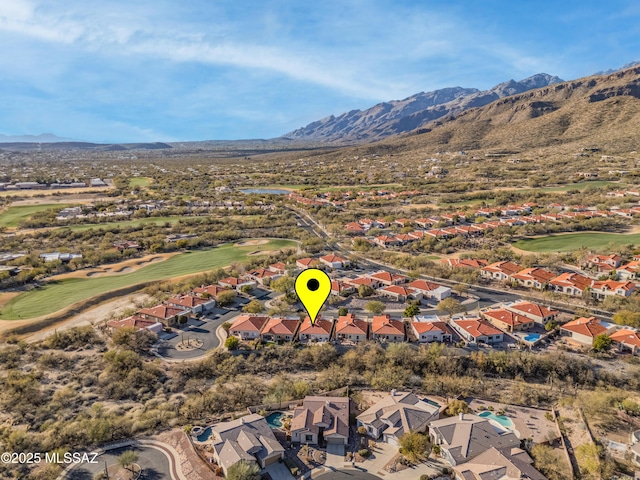 drone / aerial view featuring a mountain view