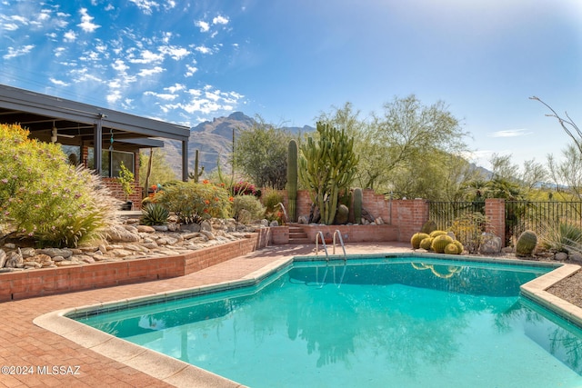 view of pool featuring a mountain view