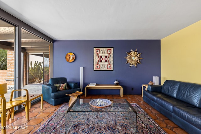 living room with tile patterned flooring