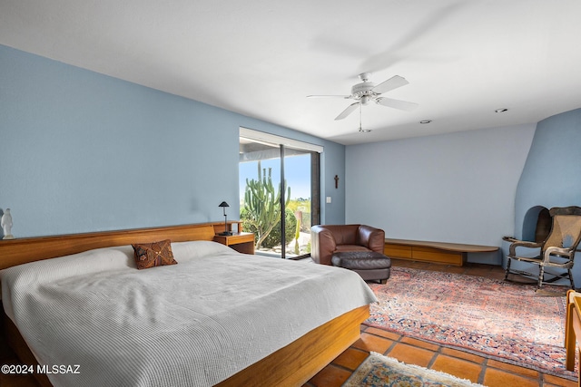 tiled bedroom featuring access to exterior and ceiling fan