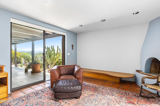 living area featuring tile patterned floors