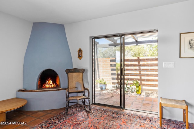 living area featuring tile patterned floors