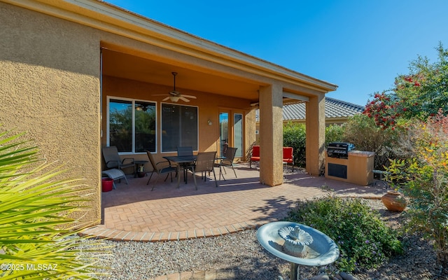 view of patio / terrace with ceiling fan