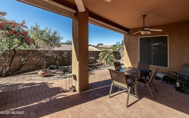 view of patio with ceiling fan