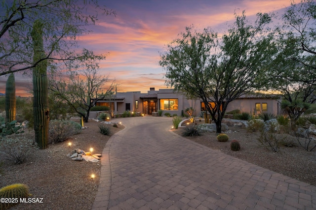 view of adobe home