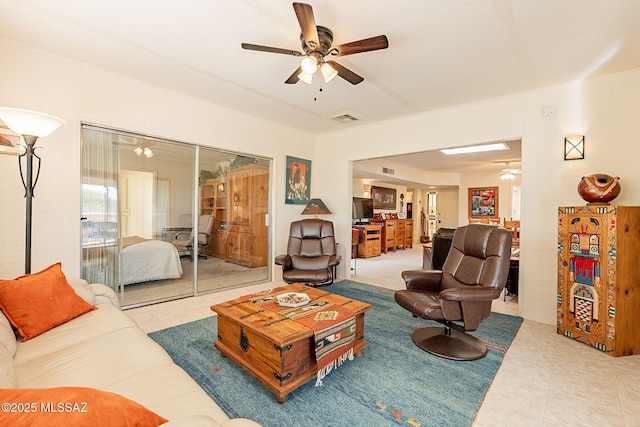 living room featuring ceiling fan