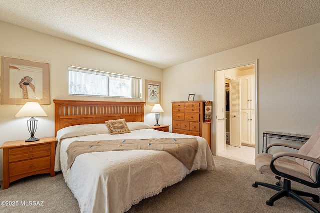 carpeted bedroom with a textured ceiling