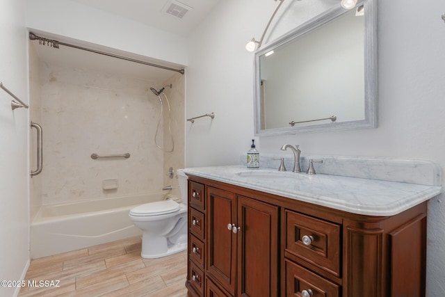 full bathroom with shower / bathing tub combination, vanity, and toilet