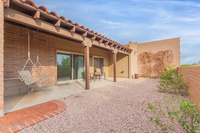 rear view of house featuring a patio area