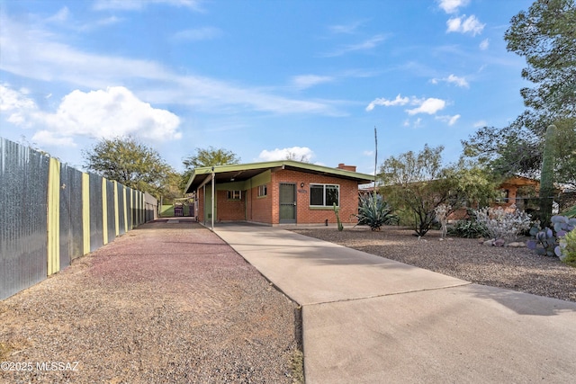 view of front of house with a carport