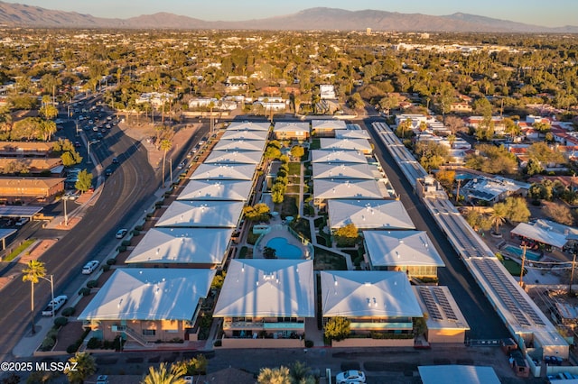 drone / aerial view featuring a mountain view