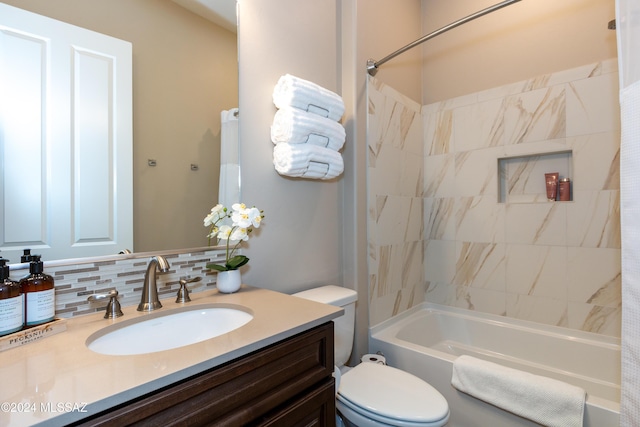 full bathroom with tasteful backsplash, vanity, shower / bath combination with curtain, and toilet