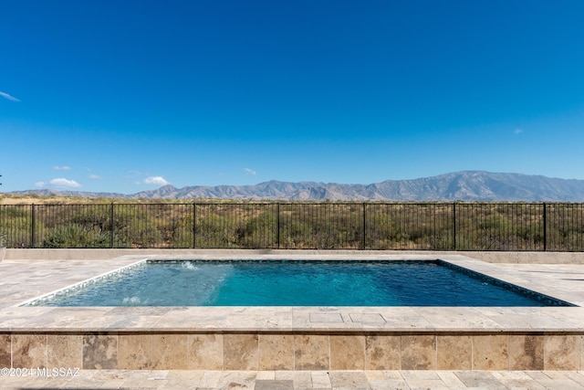 view of pool featuring a mountain view