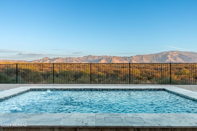 view of pool featuring a mountain view