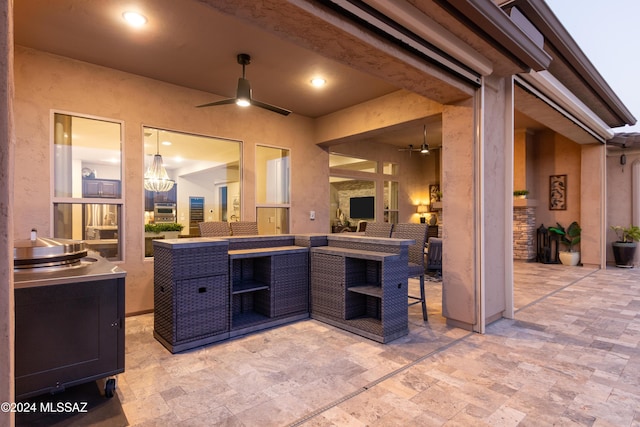 view of patio featuring outdoor lounge area and ceiling fan