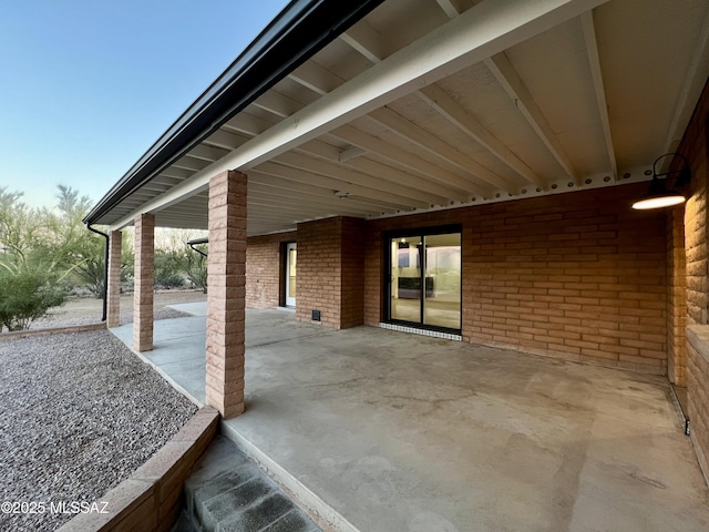 view of patio / terrace featuring a carport