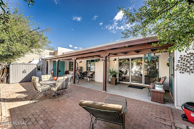 view of patio featuring a shed