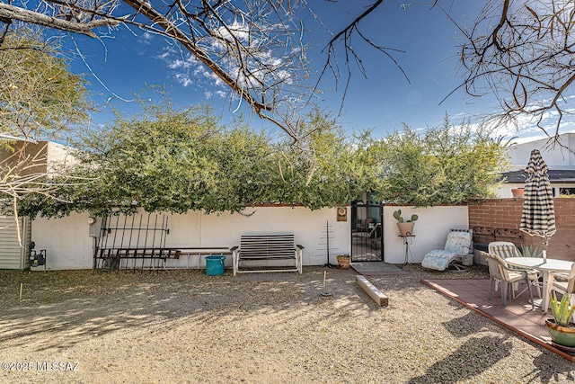 back of house featuring a patio