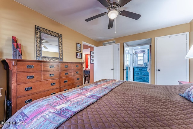 bedroom featuring ensuite bathroom and ceiling fan