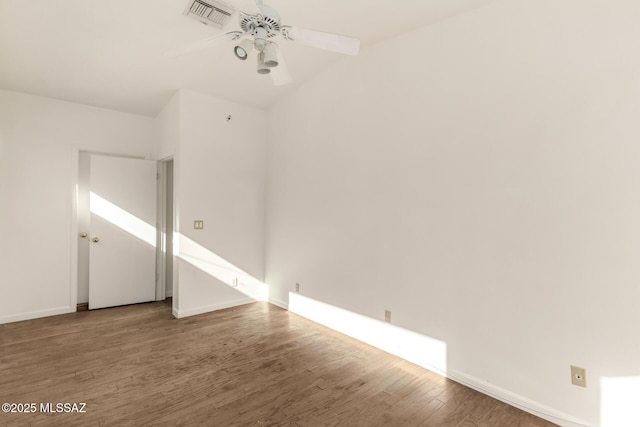 unfurnished room featuring ceiling fan and hardwood / wood-style flooring