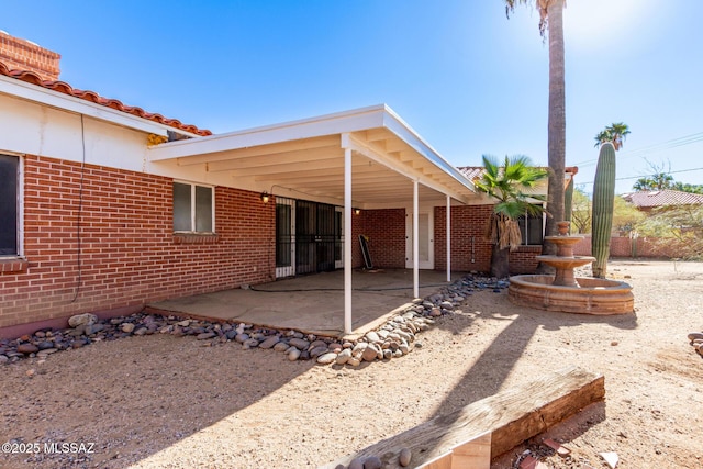 back of house featuring a patio area