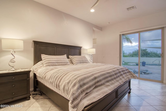 bedroom with access to exterior, recessed lighting, visible vents, and light tile patterned floors