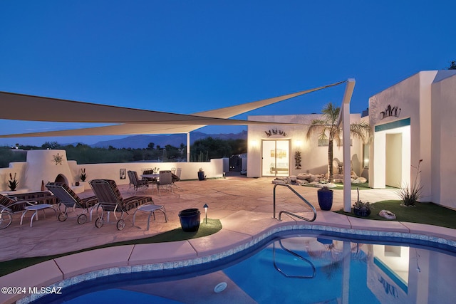 outdoor pool featuring a patio area