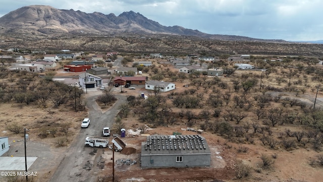 drone / aerial view with a residential view and a mountain view