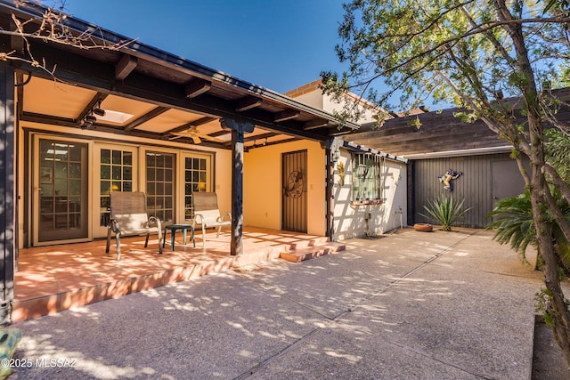 view of front of house with a patio area