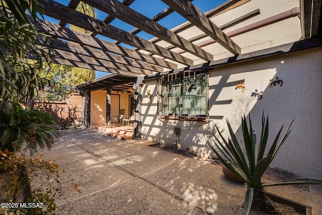 view of patio / terrace featuring a pergola