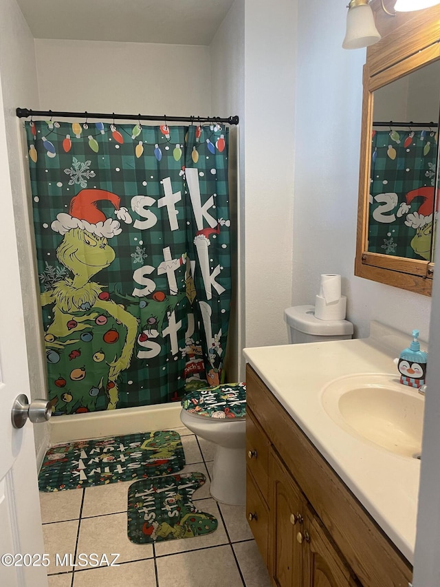 bathroom featuring tile patterned floors, vanity, toilet, and a shower with curtain