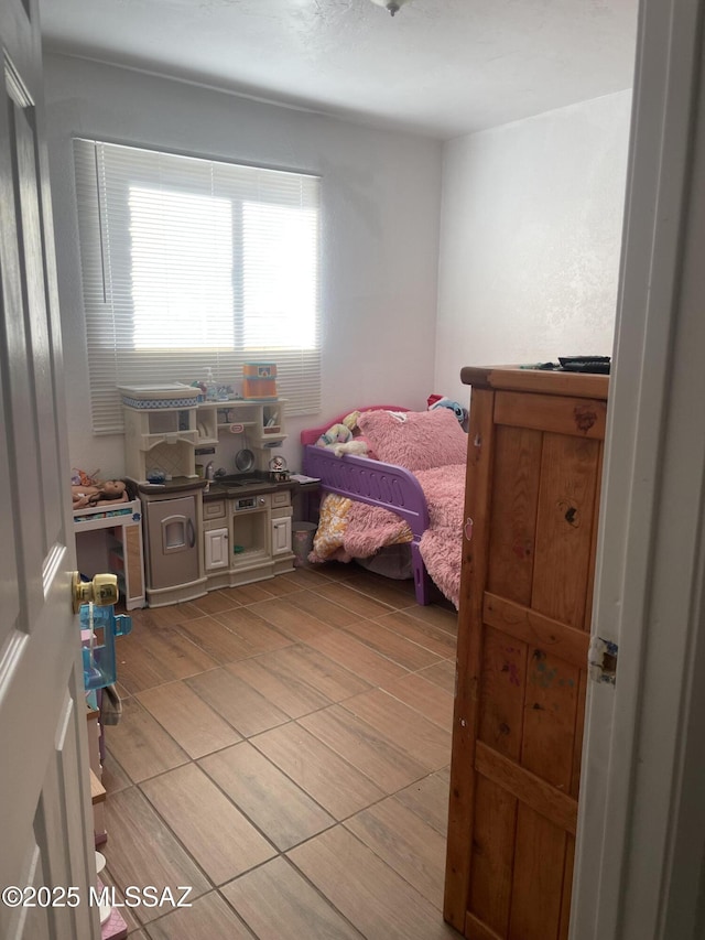 bedroom featuring light hardwood / wood-style flooring