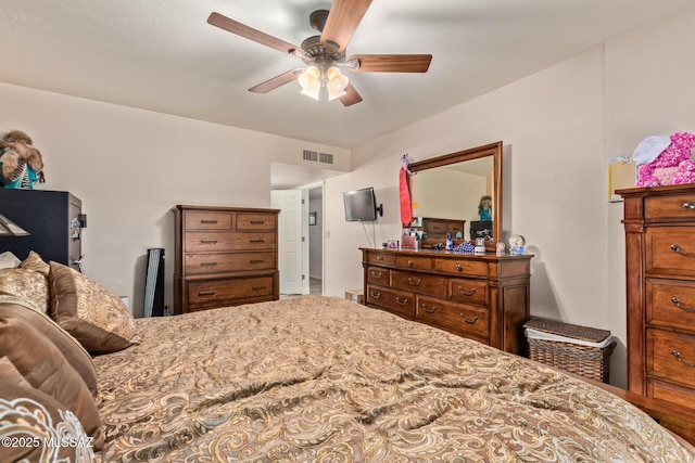 bedroom featuring ceiling fan