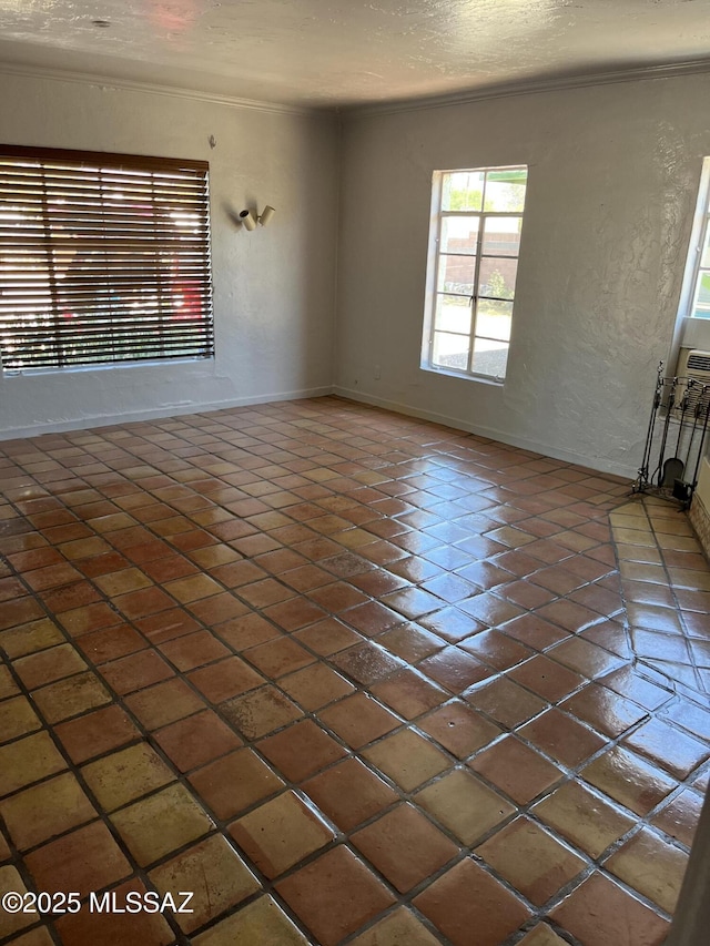 empty room with a textured ceiling