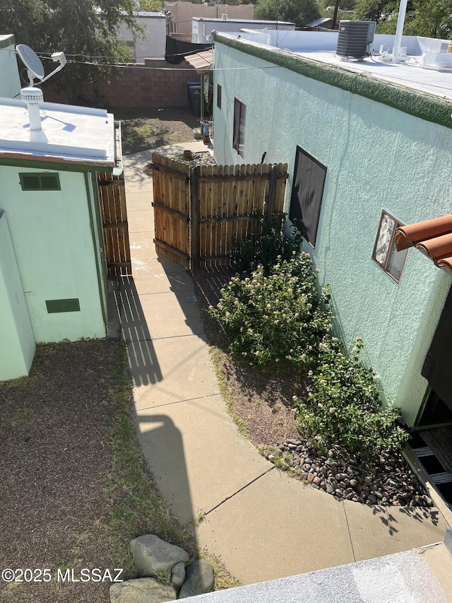 view of property exterior with cooling unit