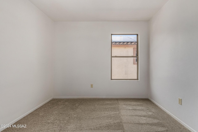 empty room featuring carpet