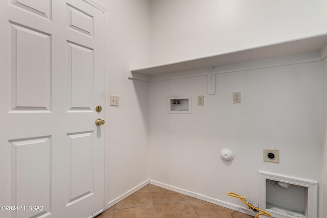 washroom with washer hookup, hookup for a gas dryer, electric dryer hookup, and light tile patterned floors