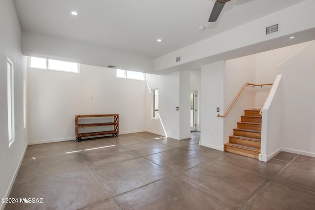 interior space featuring ceiling fan