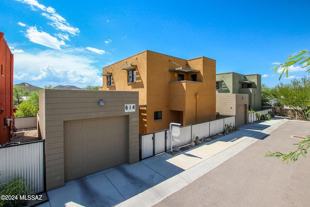 view of front of home featuring a mountain view