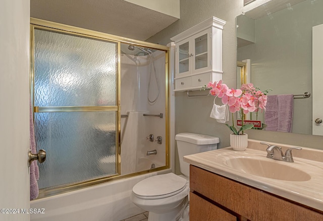 full bathroom featuring vanity, toilet, and enclosed tub / shower combo